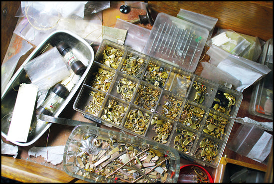 Assortment of gold pieces used for jewelry making and repairs